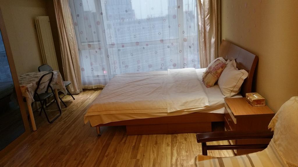Dalian Yidian Yijing Huayuan Apartment ห้อง รูปภาพ